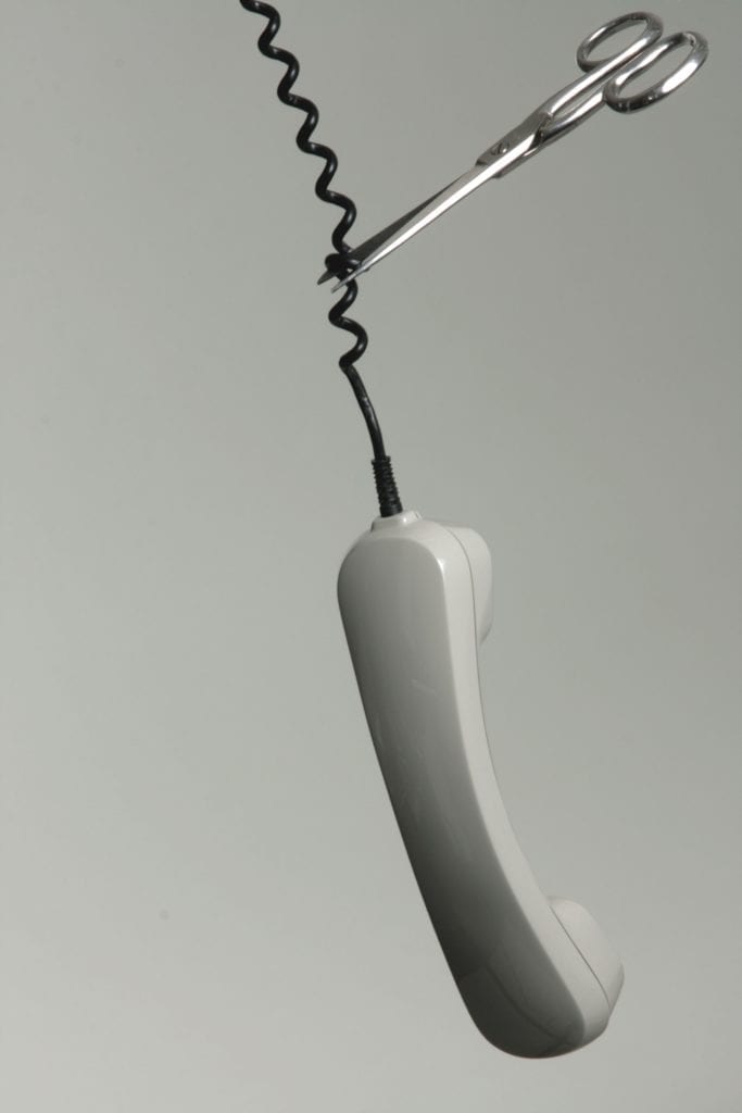 Cutting phone cord for UpLync business phone service Lafayette, IN.